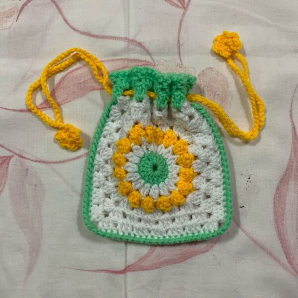 green and white designer potli