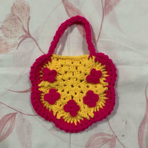 yellow and red flower designer potli