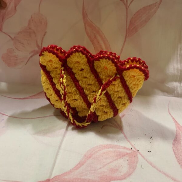 yellow and red designer potli